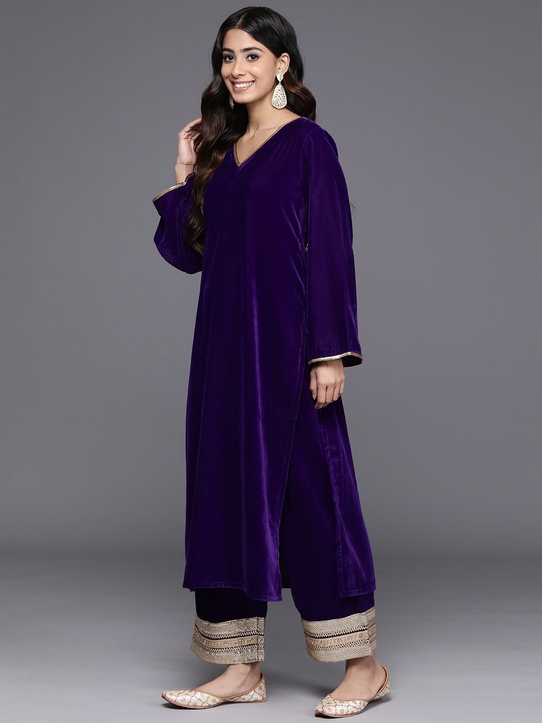 Women Purple Velvet Kurta With Flared Sleevespaired With Tonal Bottom And Contrast Dupatta With Four Sided Fringes