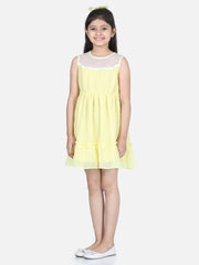 Girls Yellow Polyester Self Design Dress with Net and Lace Inserts