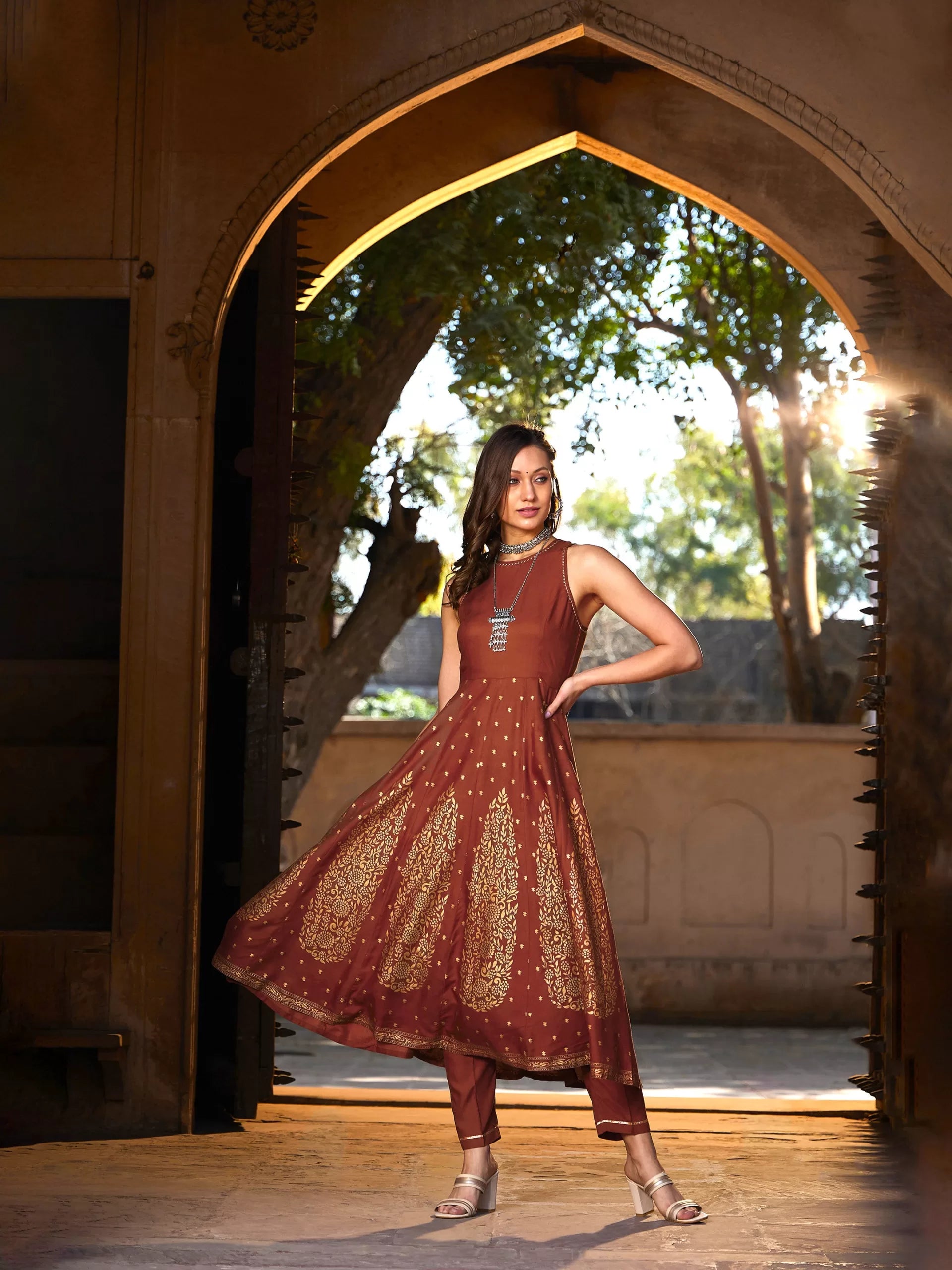 Women Rust Kali Foil Sleeveless Anarkali Kurta With Pants