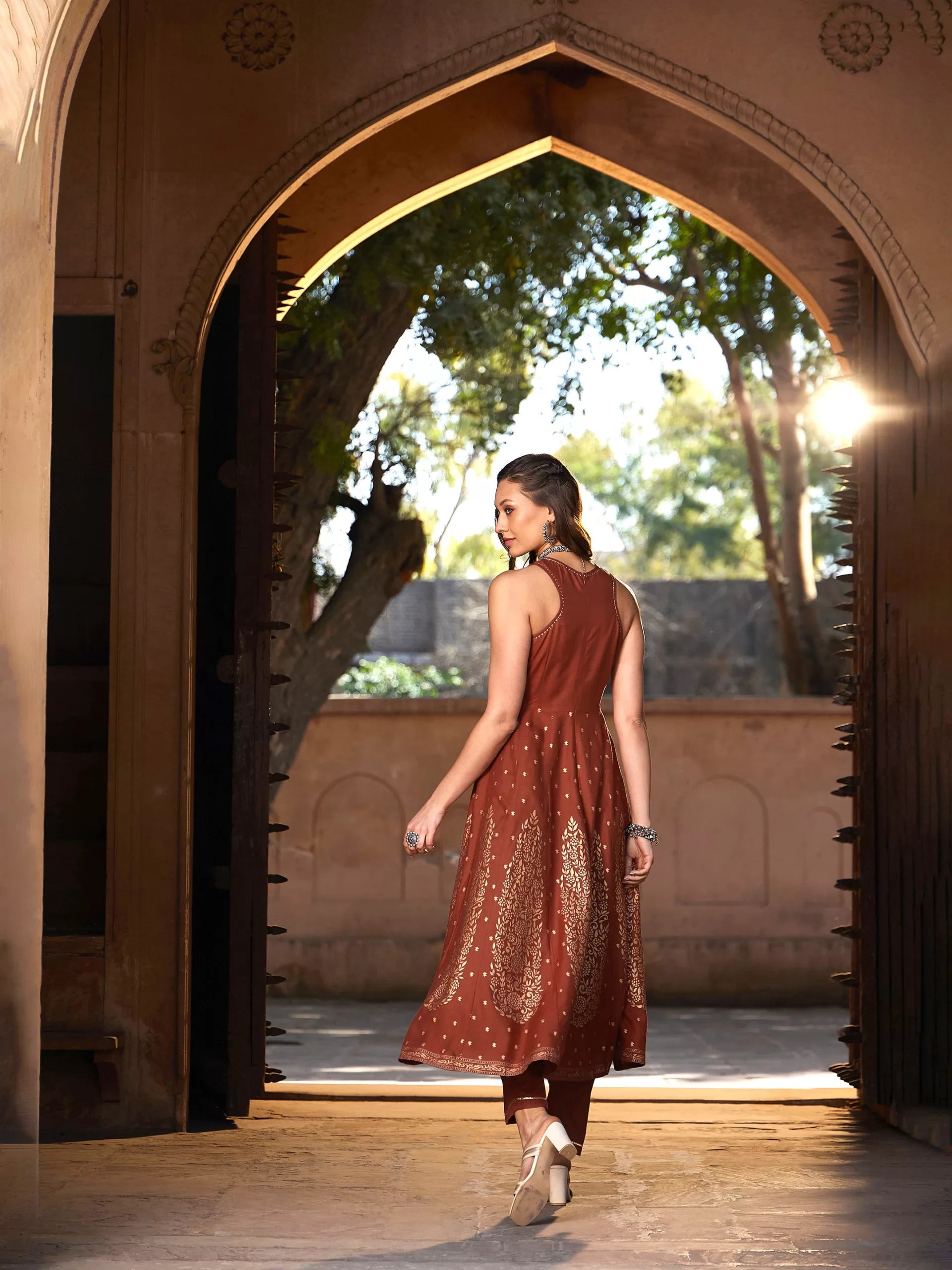 Women Rust Kali Foil Sleeveless Anarkali Kurta With Pants