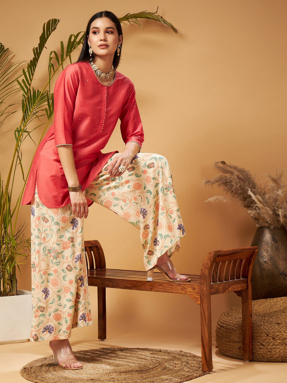 Women Pink Short Kurta With Beige Printed Flared Palazzos