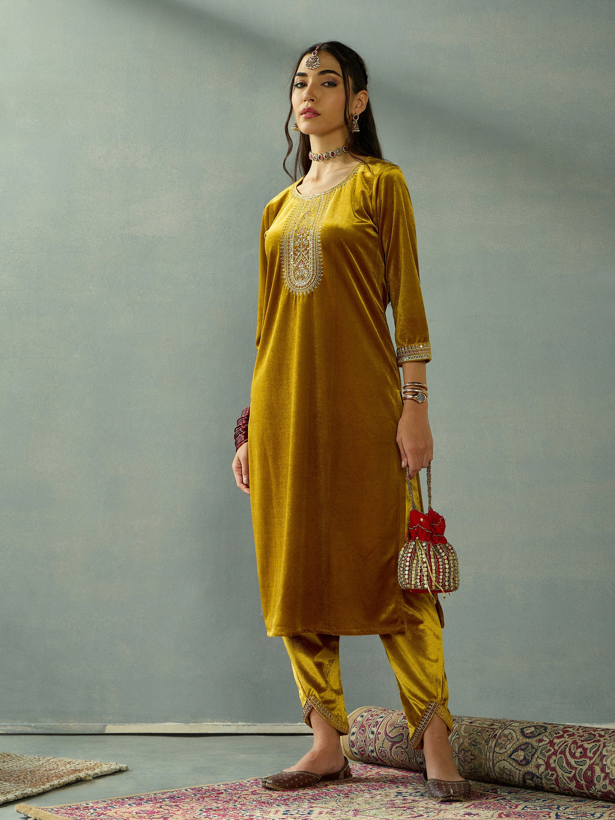 Women Mustard Velvet Embroidered Kurta With Tulip Pants