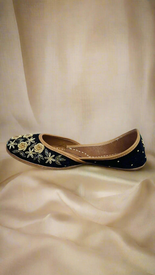 Women Black Jutti embroidered with Golden color roses