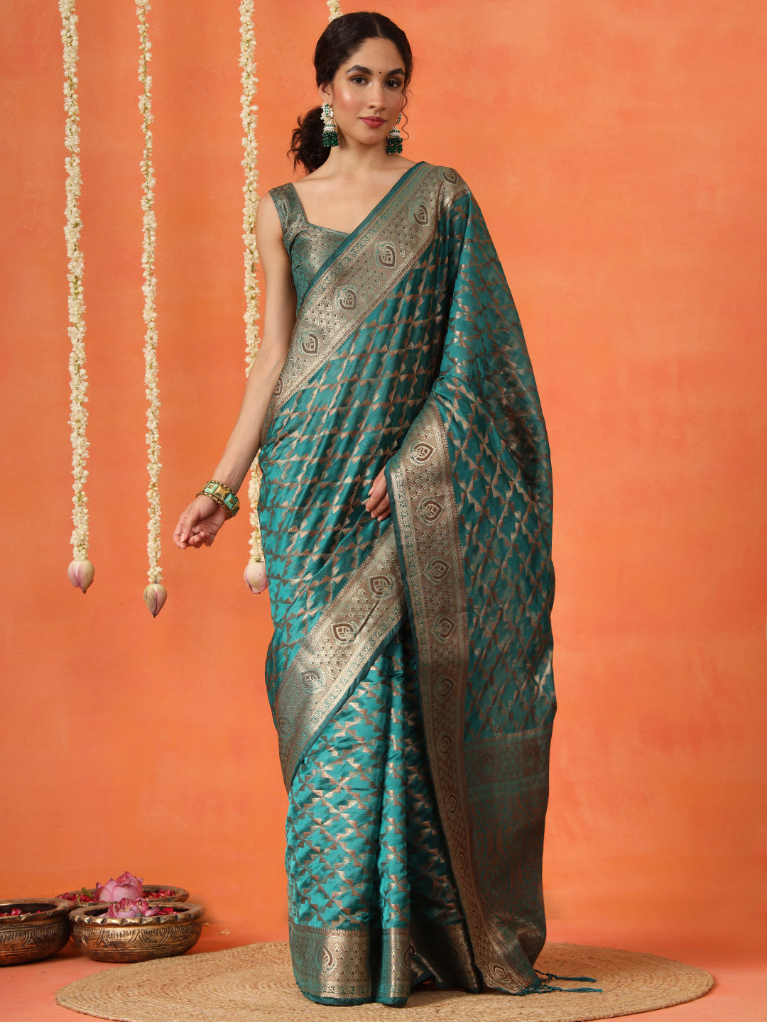 Rama colored art silk woven designer saree with tassles on pallu