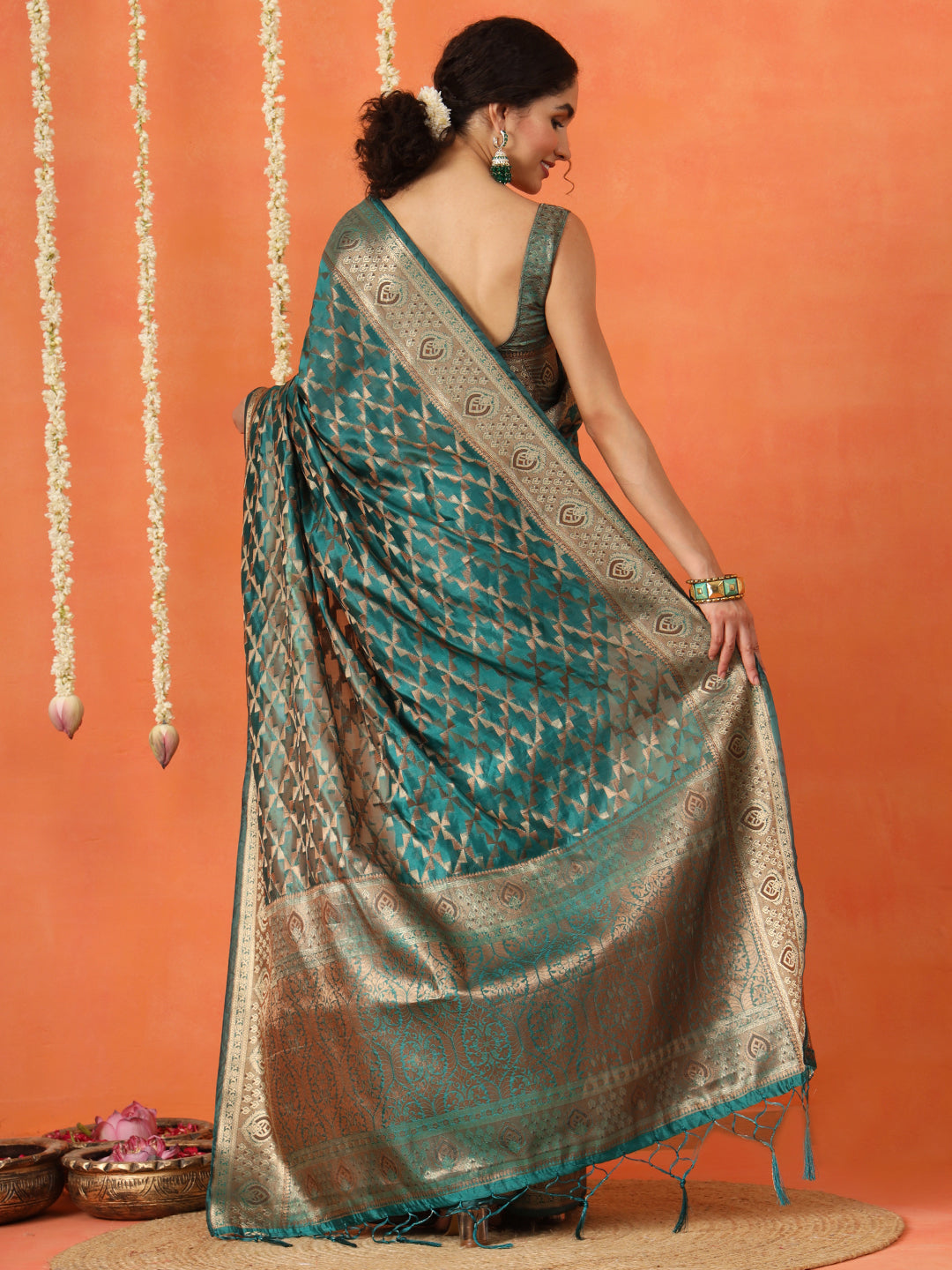 Rama colored art silk woven designer saree with tassles on pallu