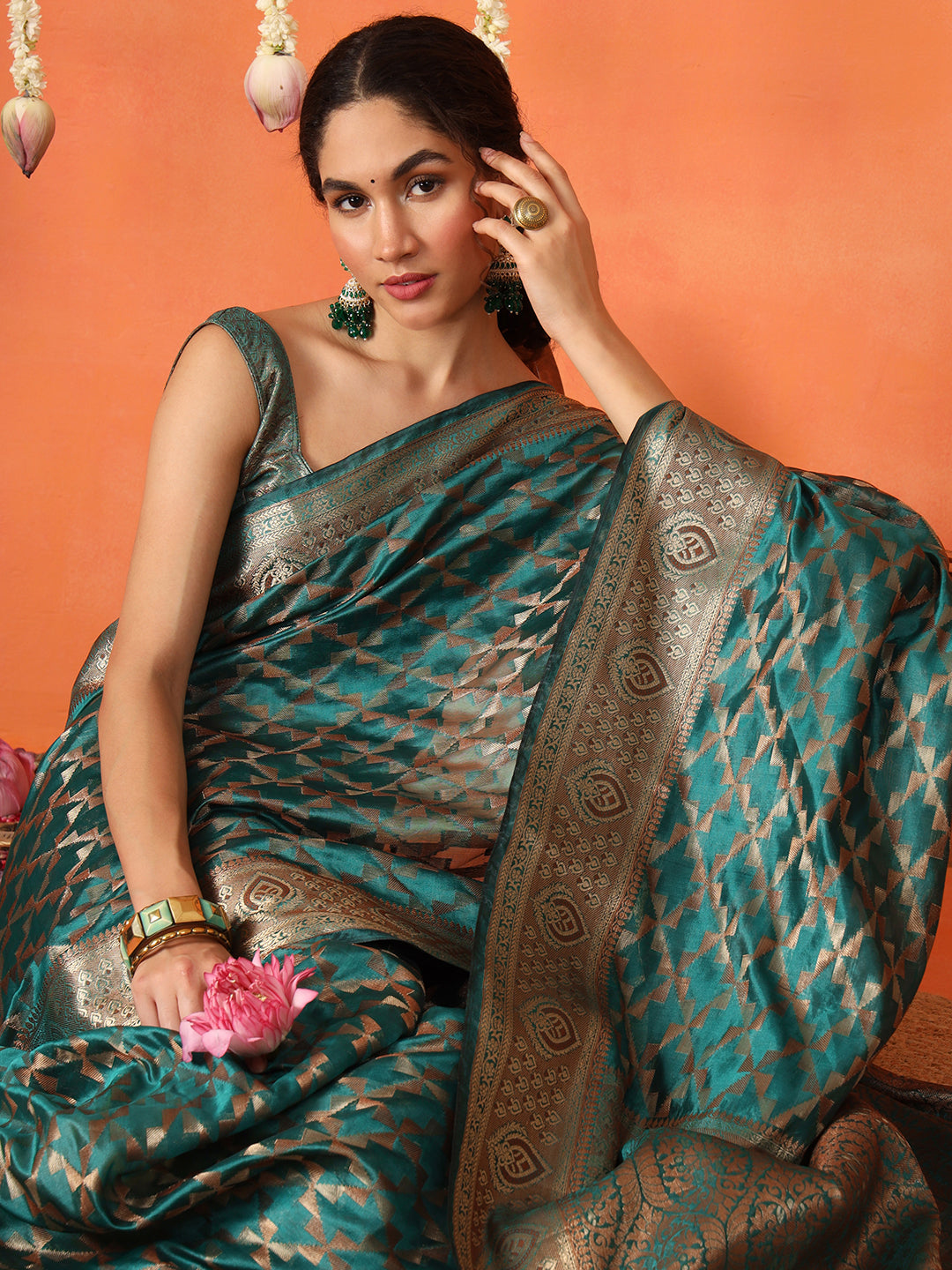 Rama colored art silk woven designer saree with tassles on pallu