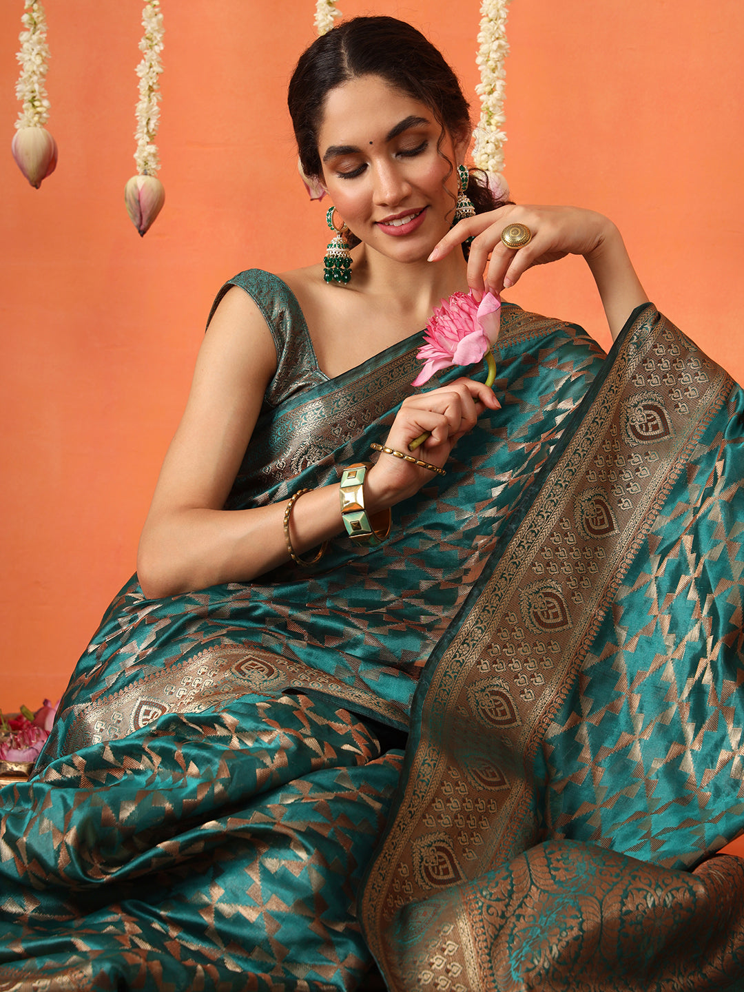 Rama colored art silk woven designer saree with tassles on pallu