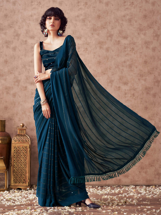 Teal colored striped saree with embroidered blouse