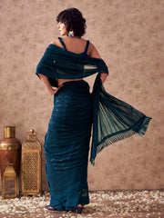 Teal colored striped saree with embroidered blouse