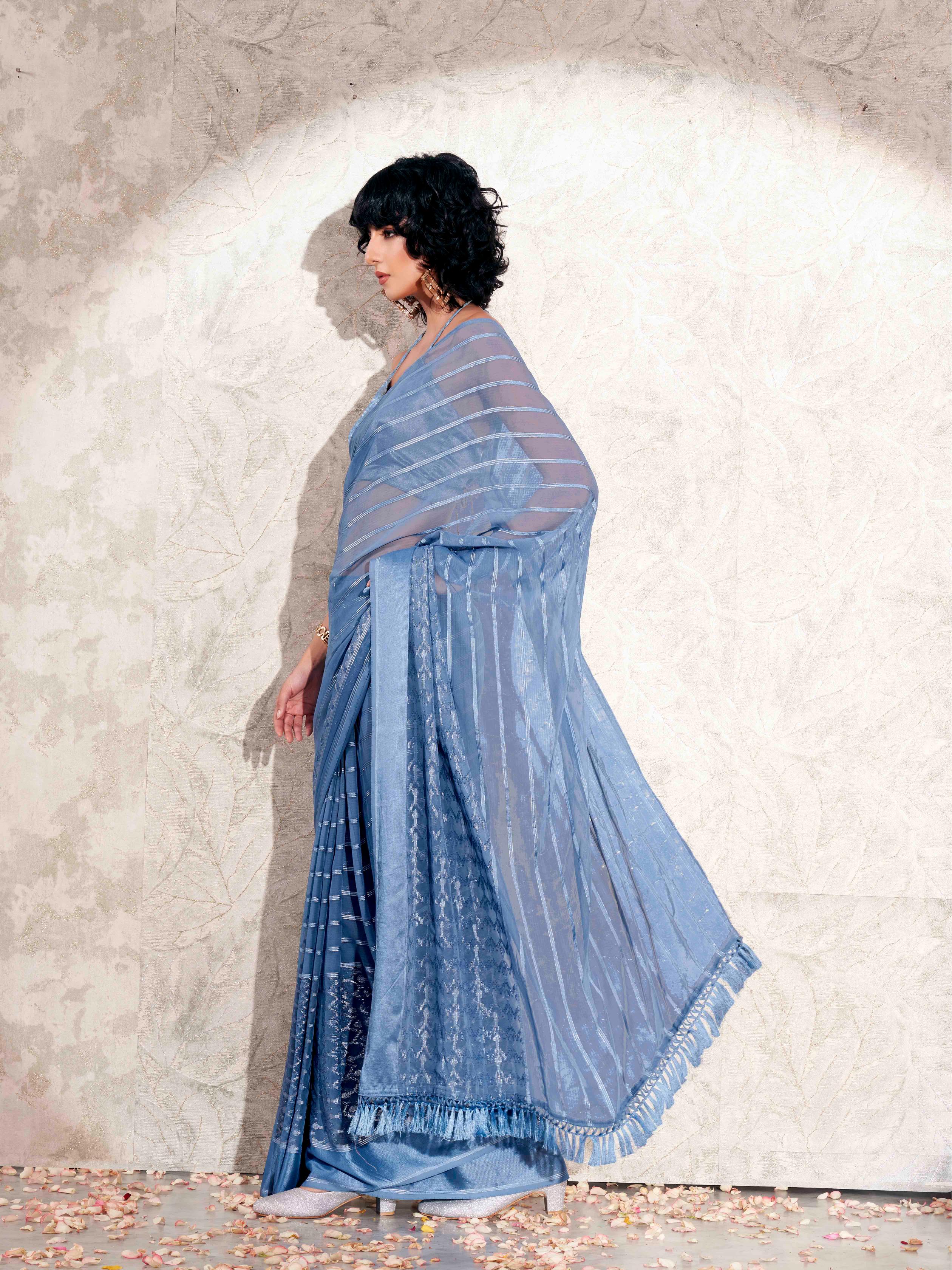 Blue colored satin striped saree