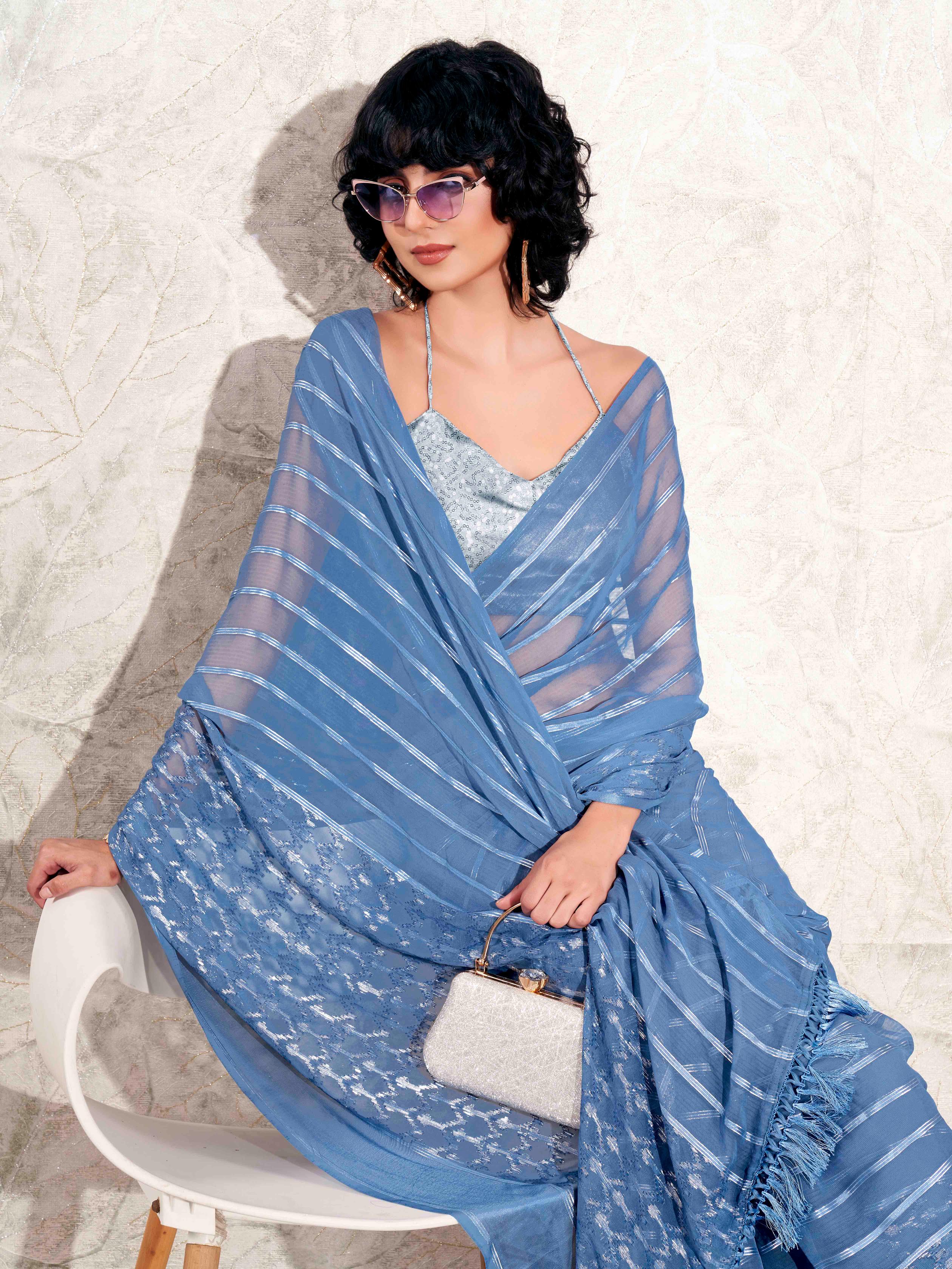 Blue colored satin striped saree