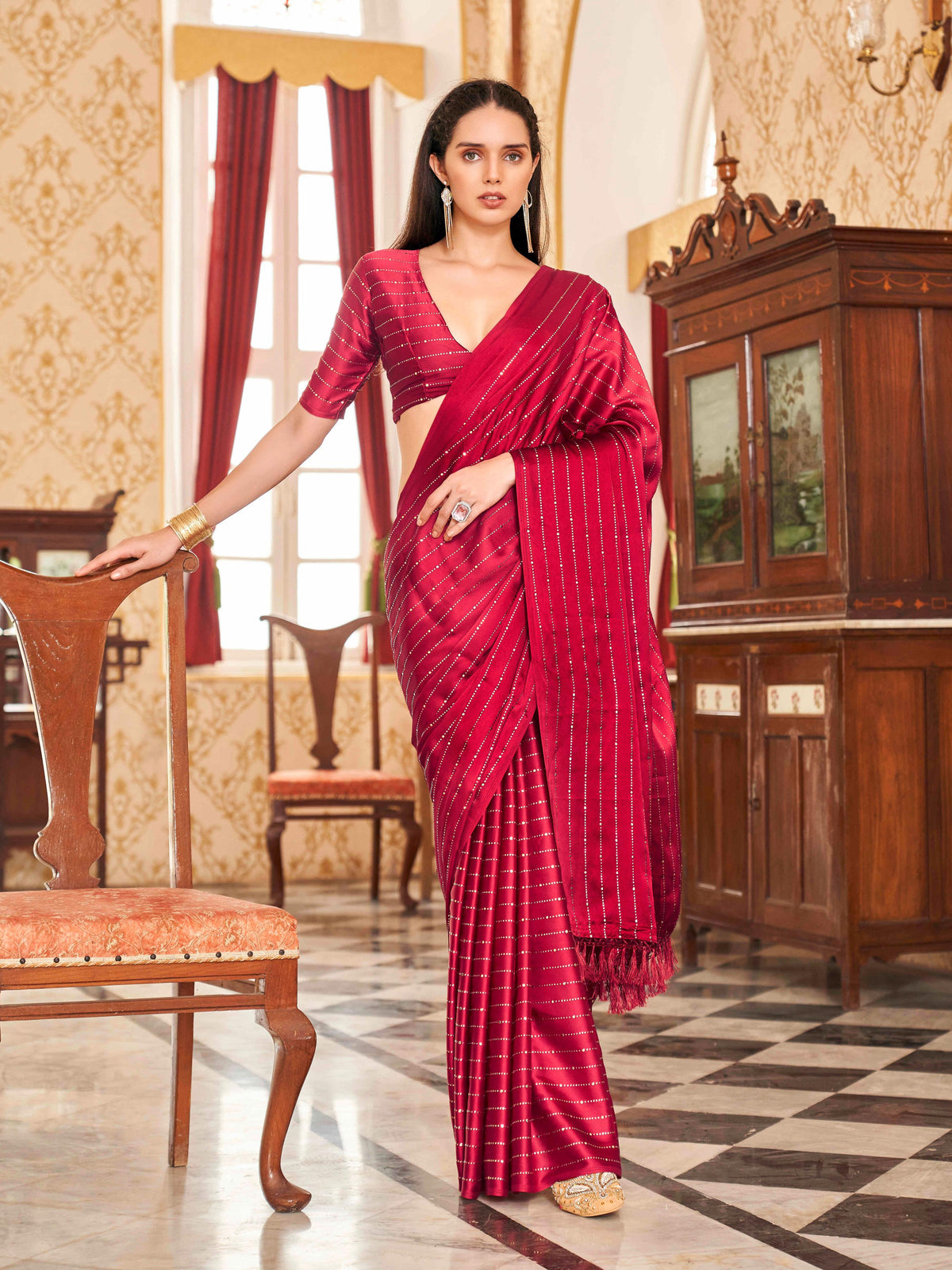 Maroon colored satin saree with mukaish work