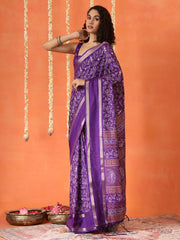 Purple colored traditional printed poly cotton saree with tassles on pallu