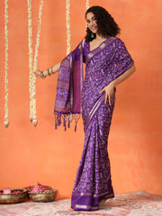 Purple colored traditional printed poly cotton saree with tassles on pallu