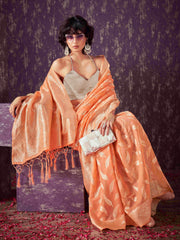 Peach colored poly cotton woven designer saree with tassles on pallu