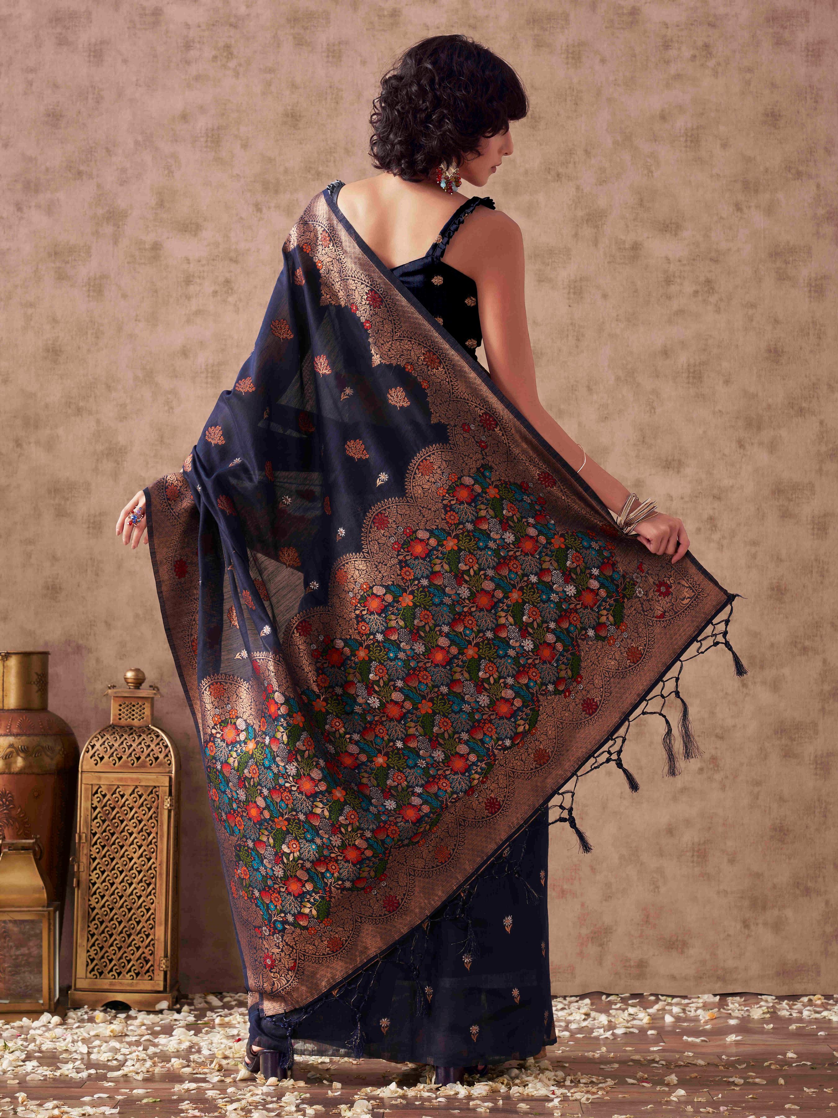 Navy blue colored poly cotton woven designer saree with tassles on pallu