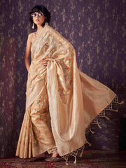 Beige colored poly cotton woven designer saree with tassles on pallu