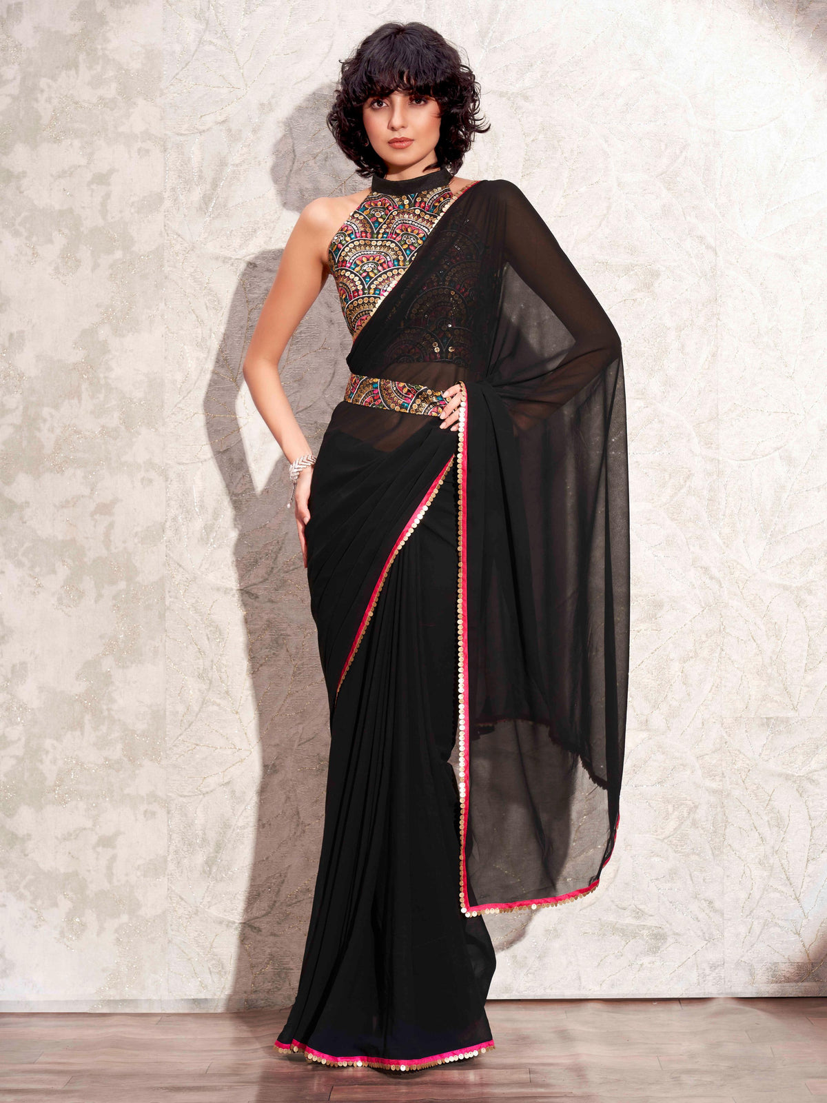 Black solid georgette saree with embroidered blouse & belt