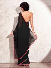 Black solid georgette saree with embroidered blouse & belt