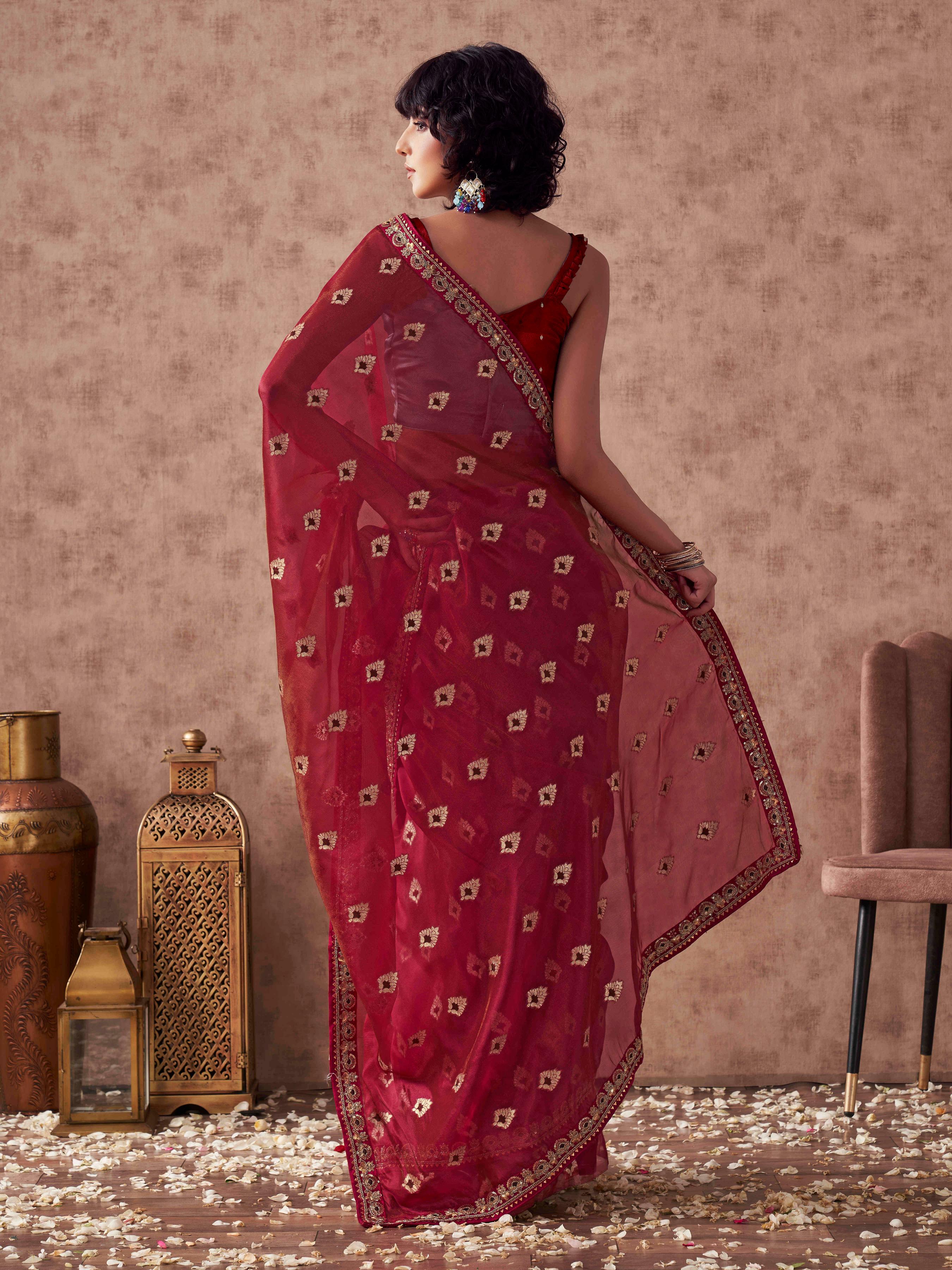 Pink colored linen jacquard saree with embroidered lace