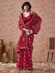 Pink colored linen jacquard saree with embroidered lace