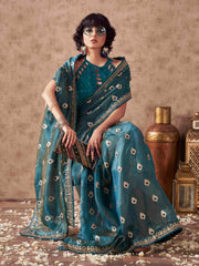 Teal colored linen jacquard saree with embroidered lace