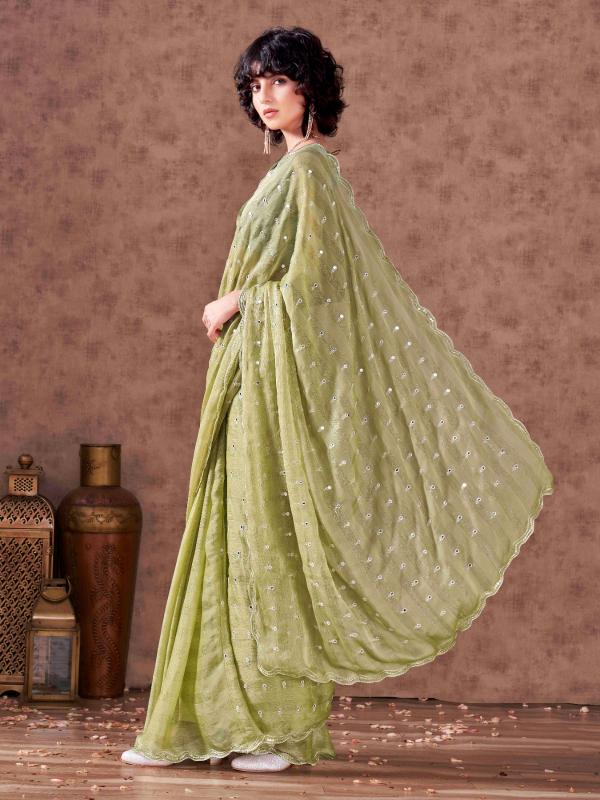 Pista green colored striped satin chiffon saree with mirror embroidery on pallu and scalloped border