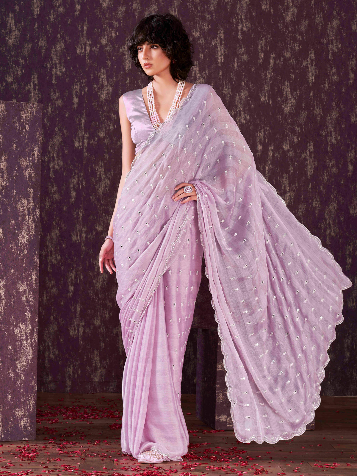 Lavendar colored striped satin chiffon saree with mirror embroidery on pallu and scalloped border