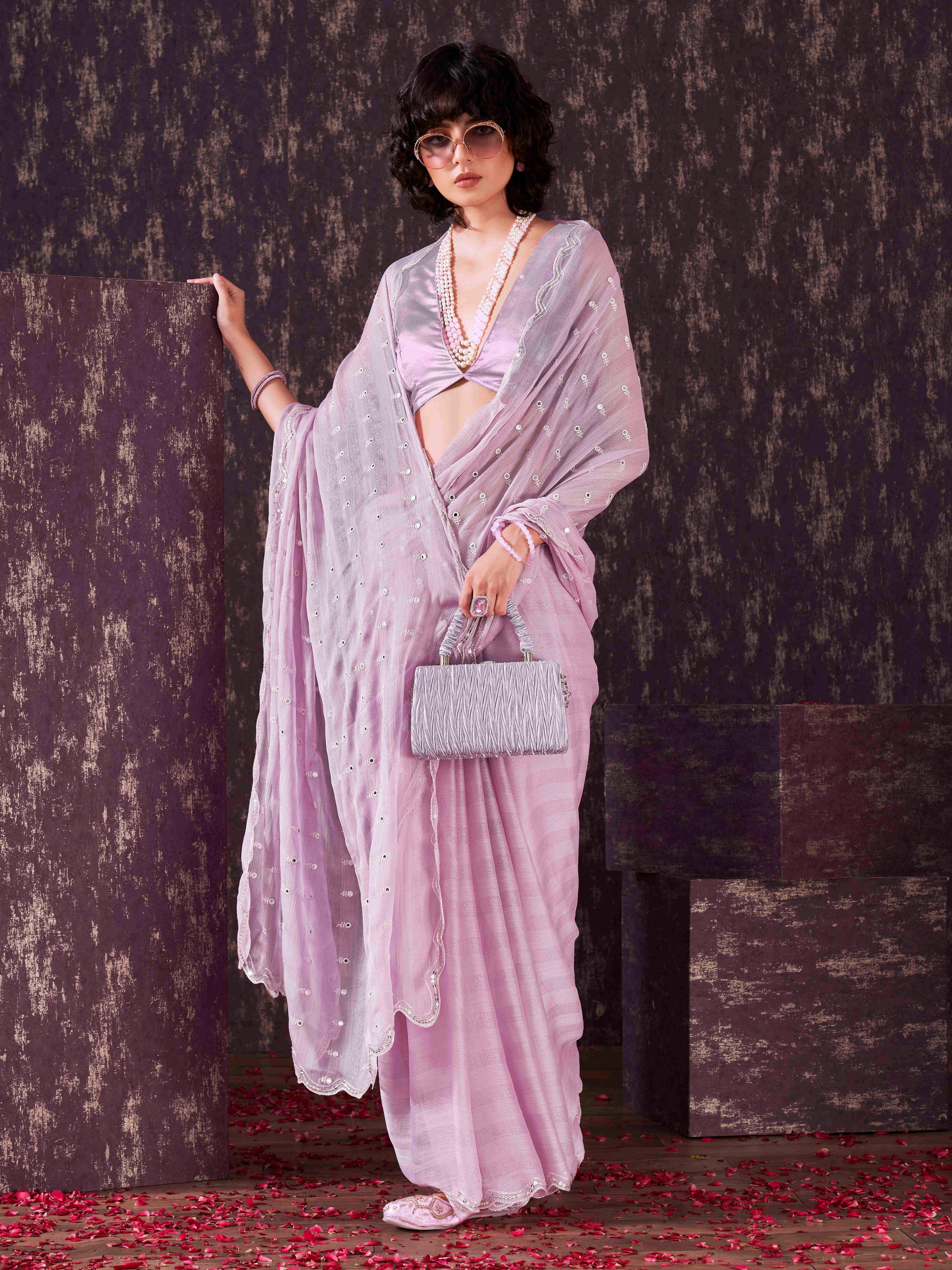 Lavendar colored striped satin chiffon saree with mirror embroidery on pallu and scalloped border