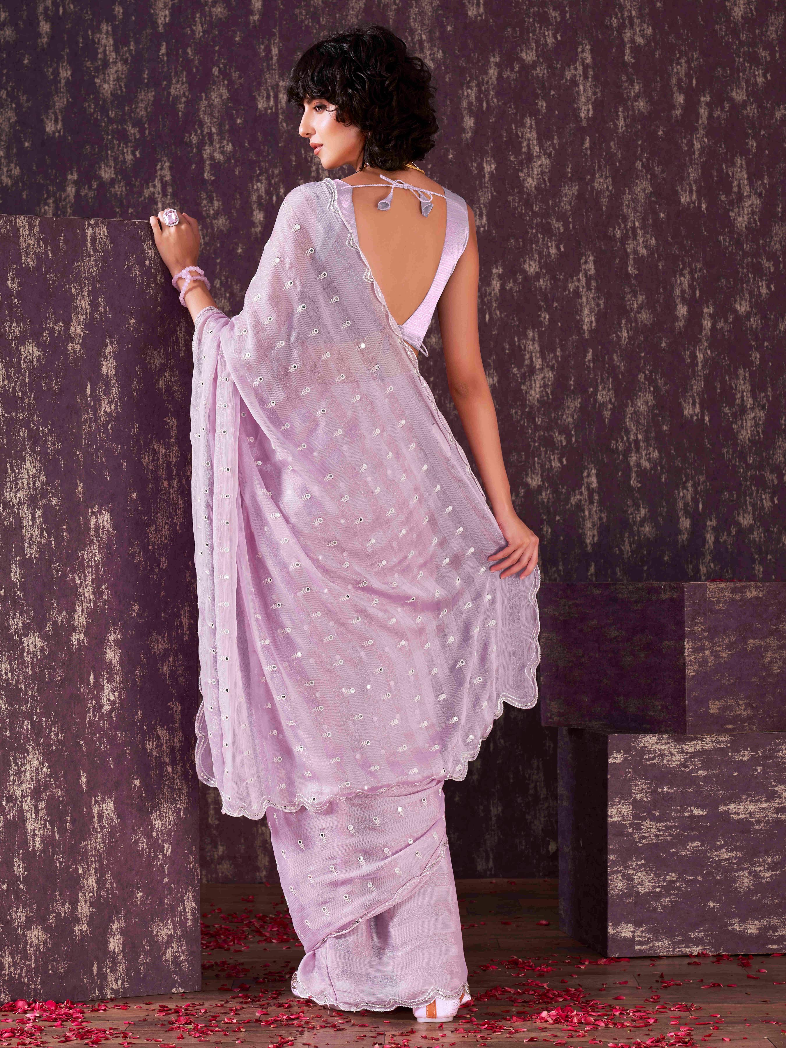 Lavendar colored striped satin chiffon saree with mirror embroidery on pallu and scalloped border