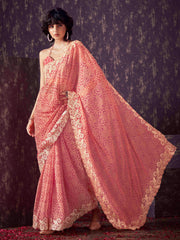 Peach colored poly georgette bandhni saree with gota patti c-pallu embroidery