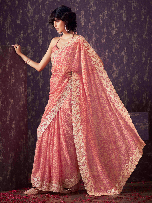 Peach colored poly georgette bandhni saree with gota patti c-pallu embroidery