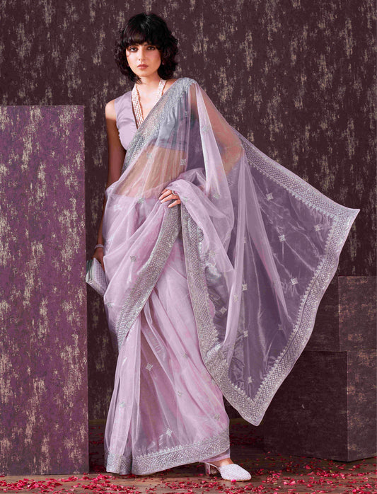 Lavendar colored shimmer net sequinned embroidered saree with embroidered blouse