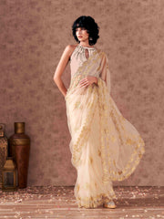 Cream colored net saree with thread work scalloped border and faux diamonds