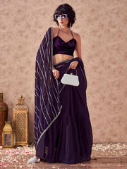 Violet colored satin saree with gota patti lining on pallu and frill on patli