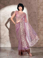 Lavendar colored shimmer net saree with jari embroidery scalloped border and faux diamonds