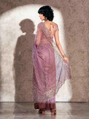 Lavendar colored shimmer net saree with jari embroidery scalloped border and faux diamonds