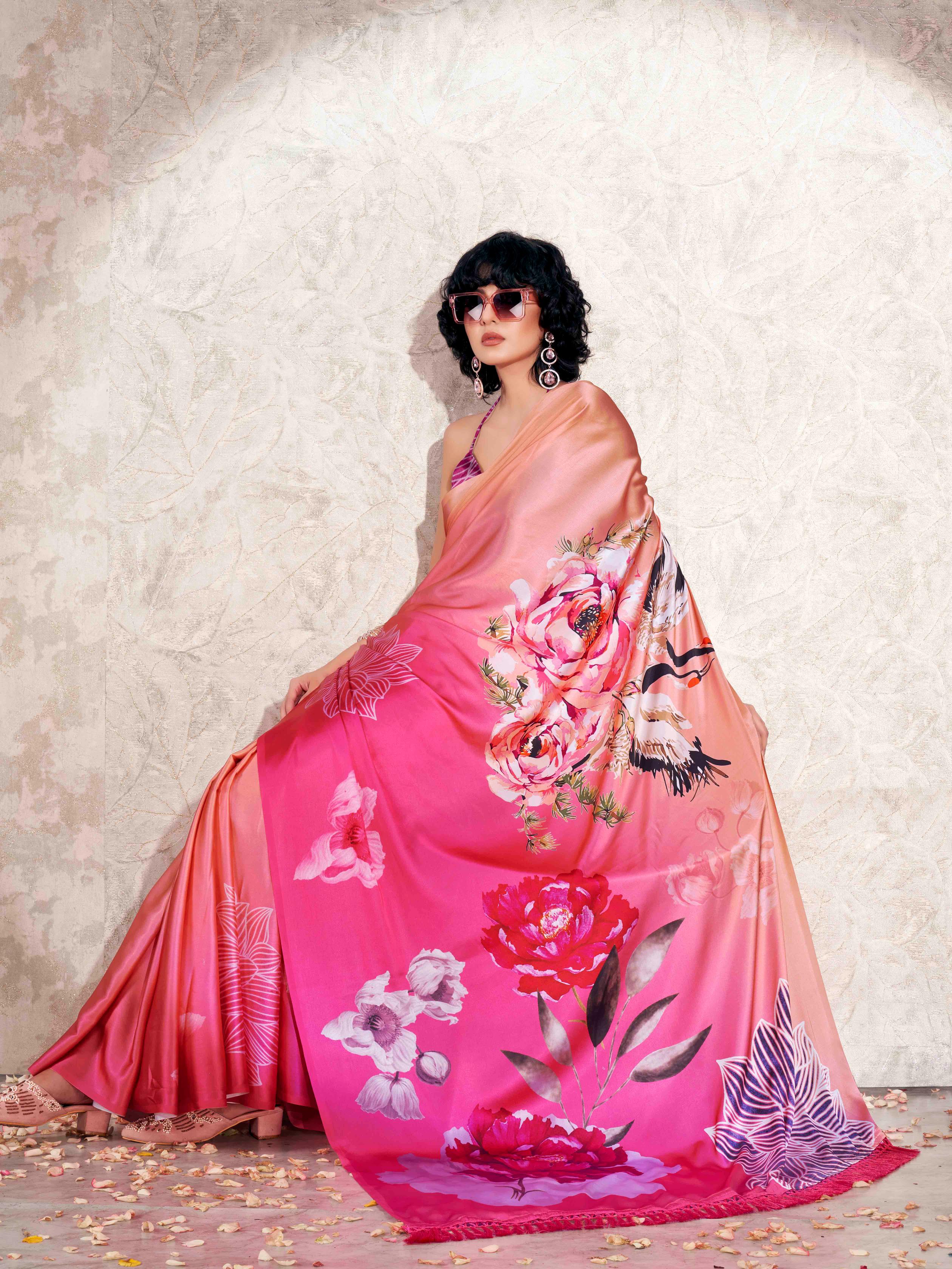 Pink colored digital printed floral design with tassles on pallu