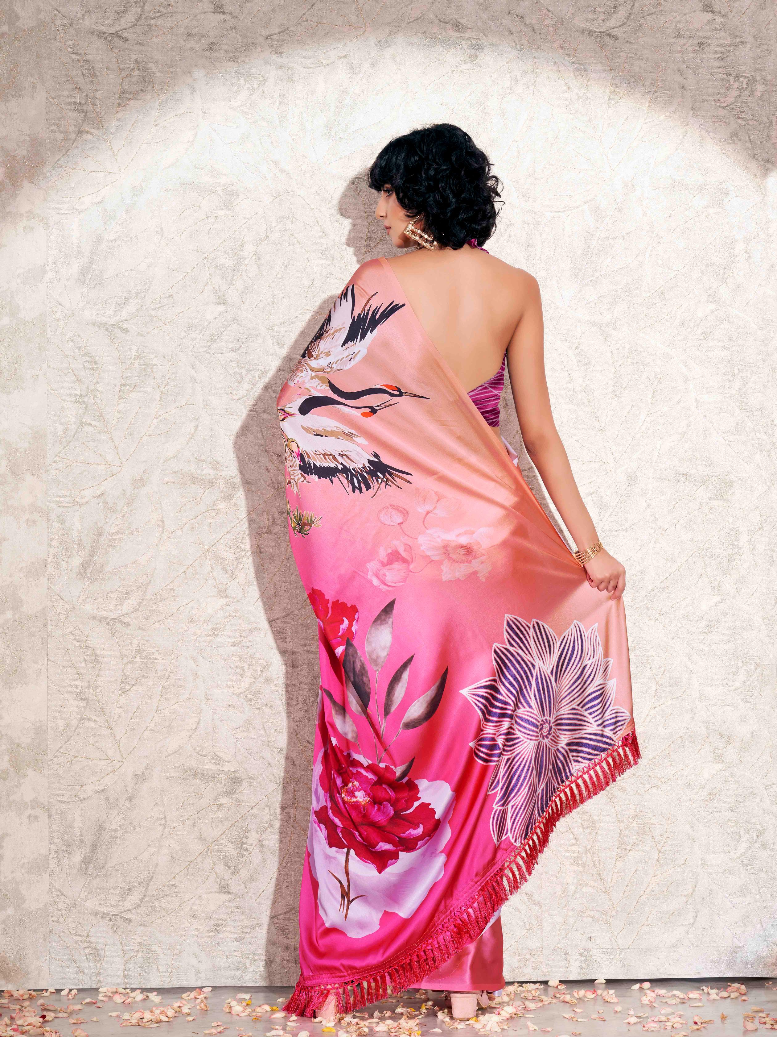 Pink colored digital printed floral design with tassles on pallu