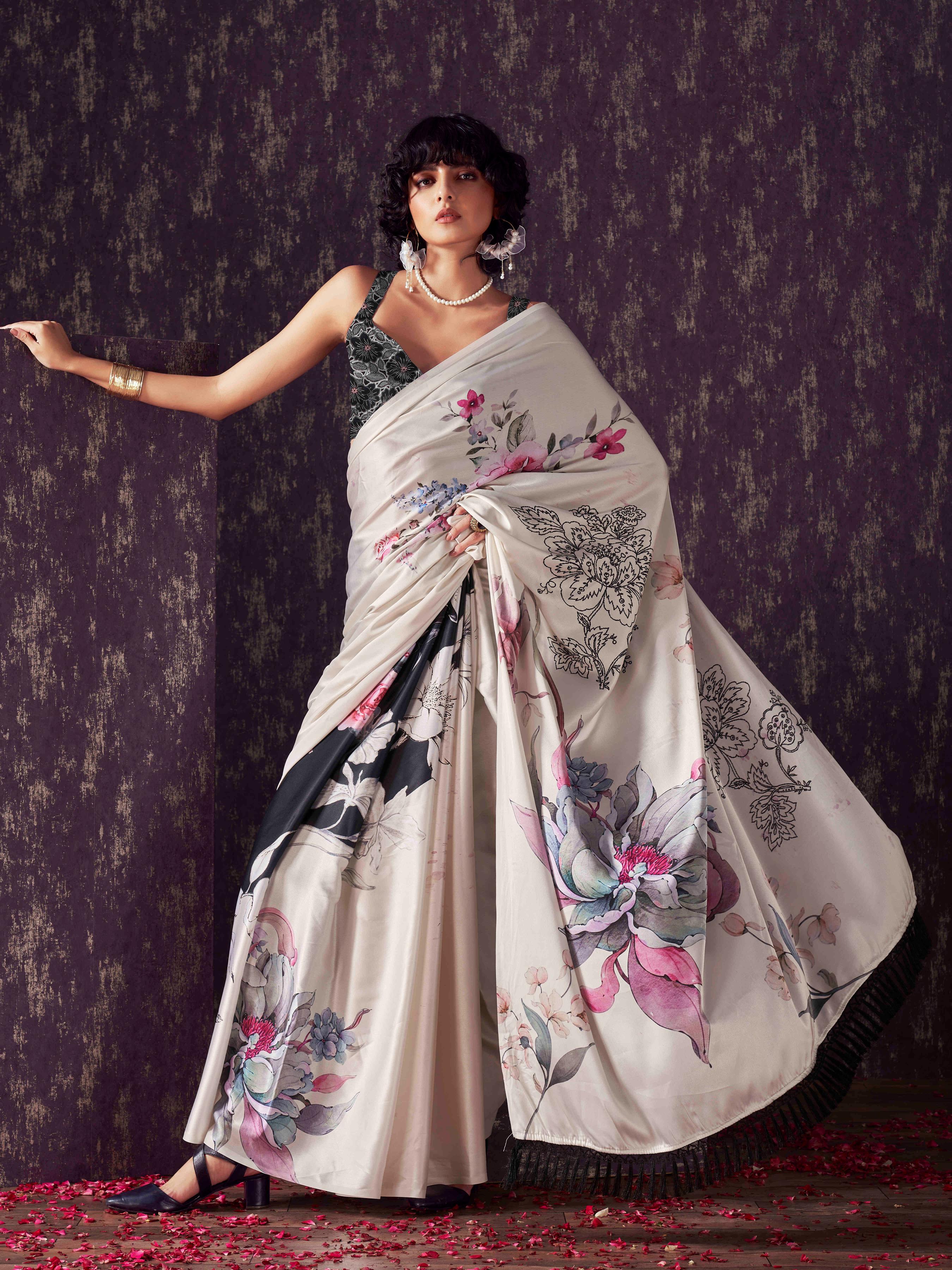 Two ways wearable cream and black colored digital printed floral satin saree with tassles