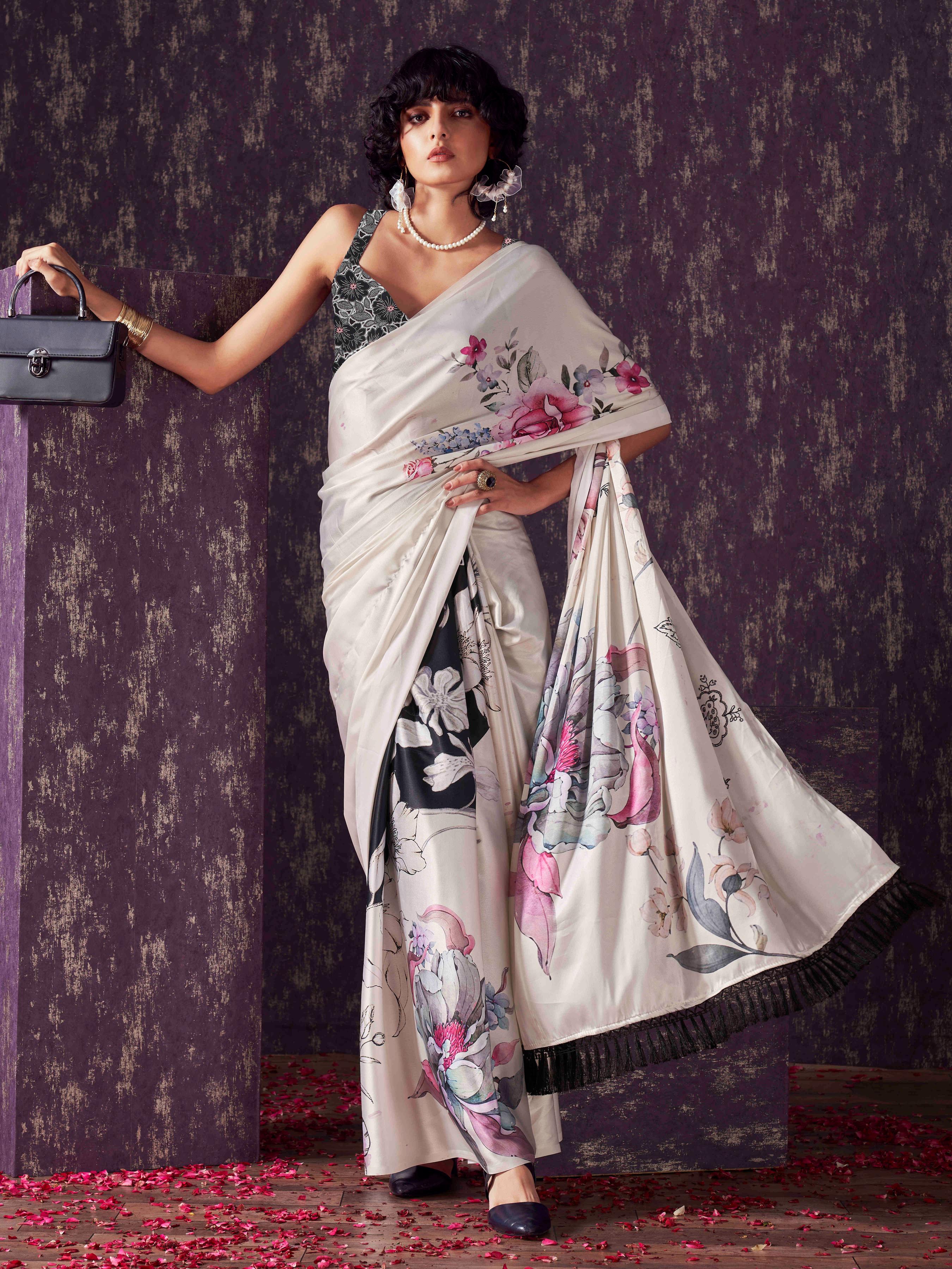 Two ways wearable cream and black colored digital printed floral satin saree with tassles