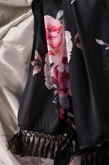 Two ways wearable cream and black colored digital printed floral satin saree with tassles