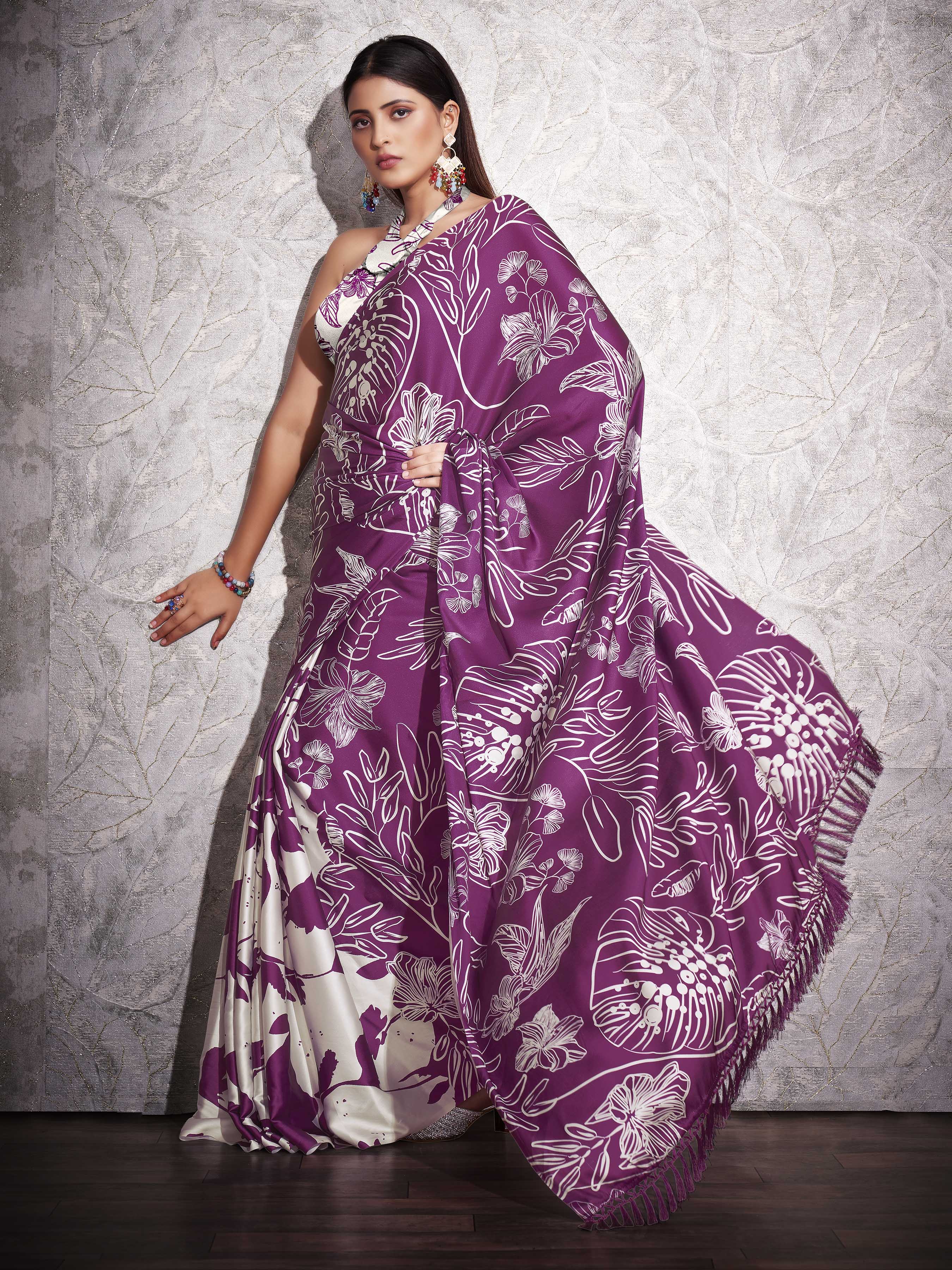 Two ways wearable cream and violet colored digital printed floral satin saree with tassles