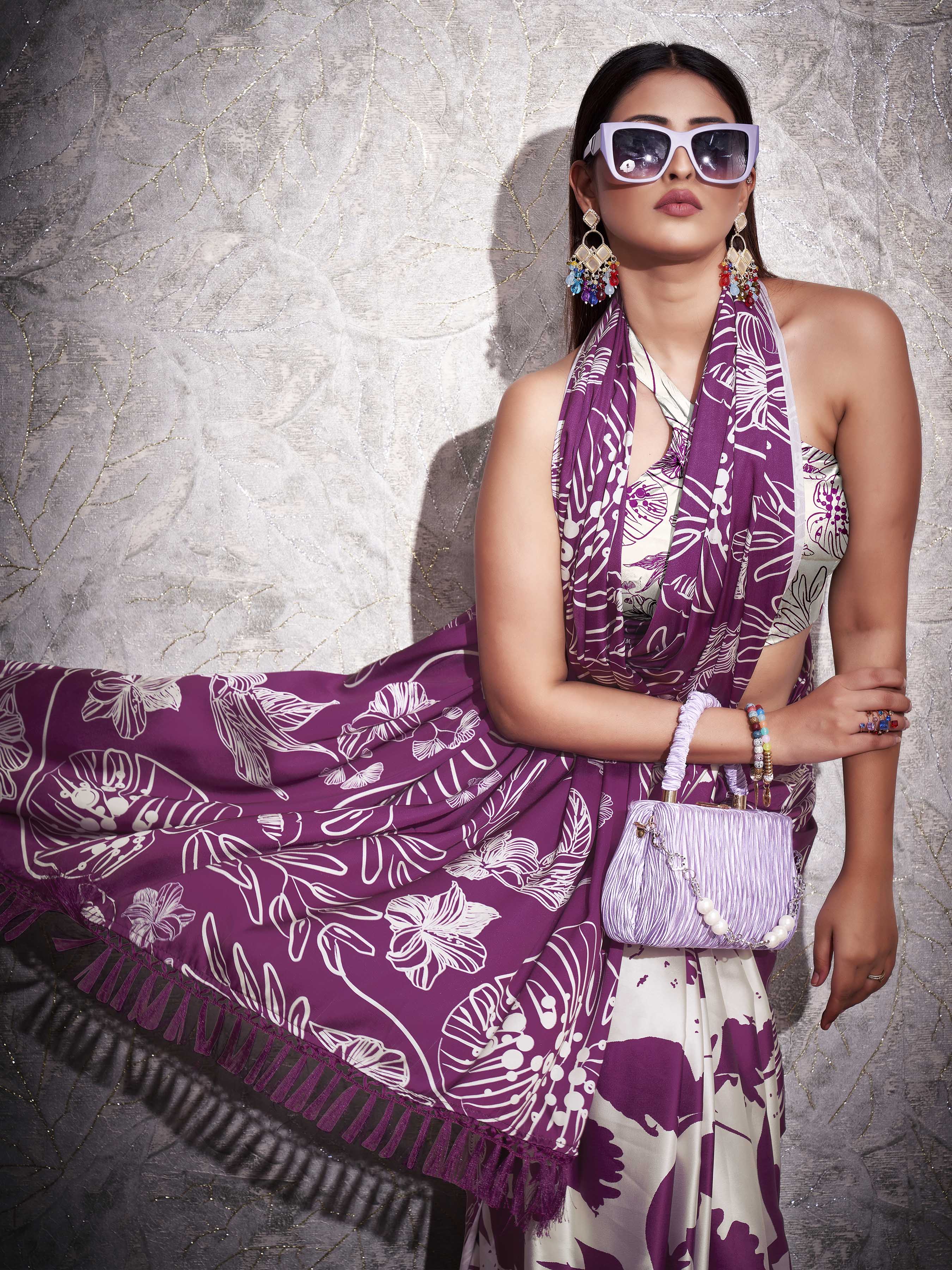 Two ways wearable cream and violet colored digital printed floral satin saree with tassles