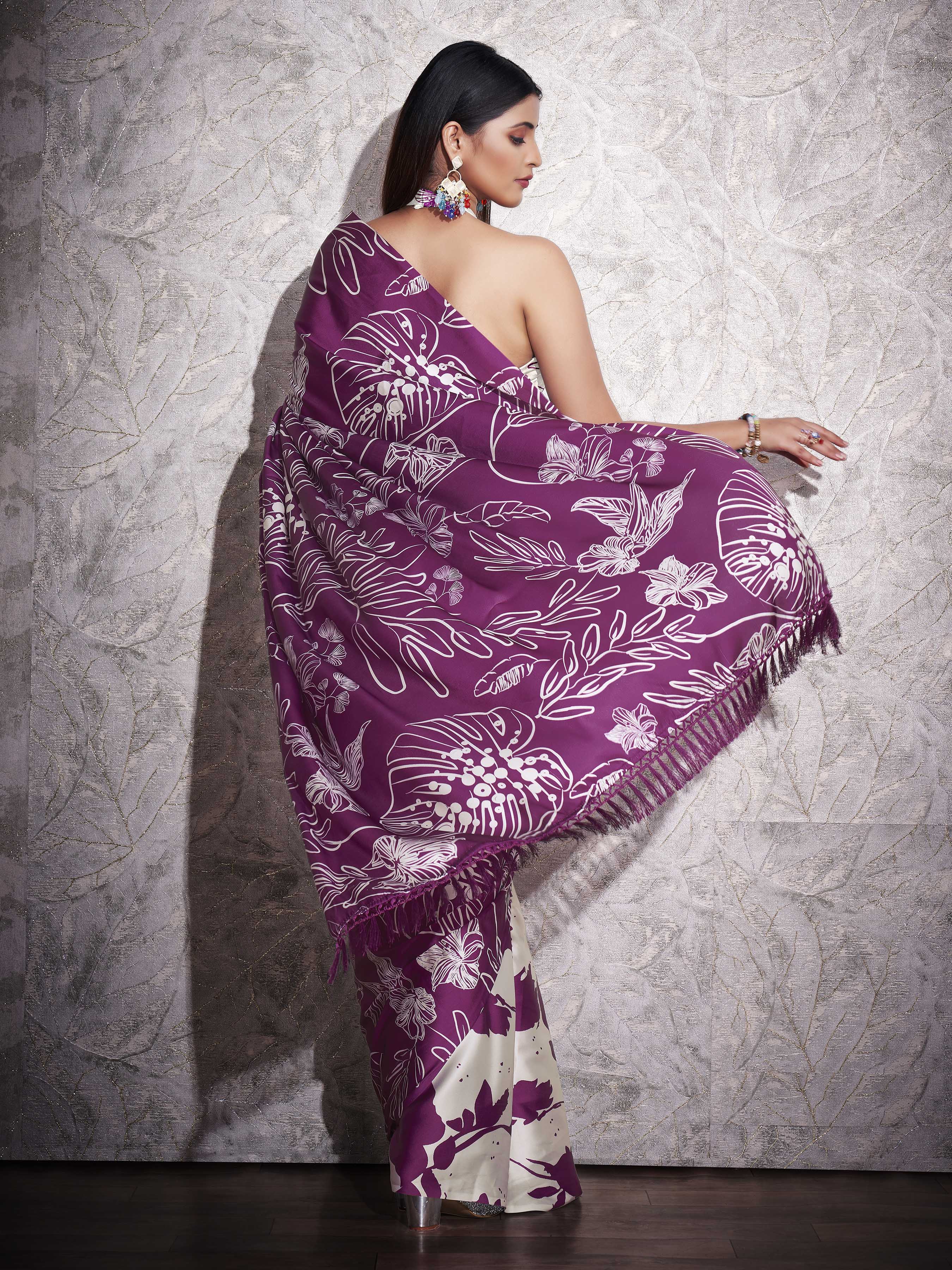 Two ways wearable cream and violet colored digital printed floral satin saree with tassles