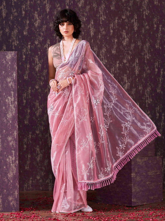 Pink colored half and half sequin embroidered net saree with embellished lace