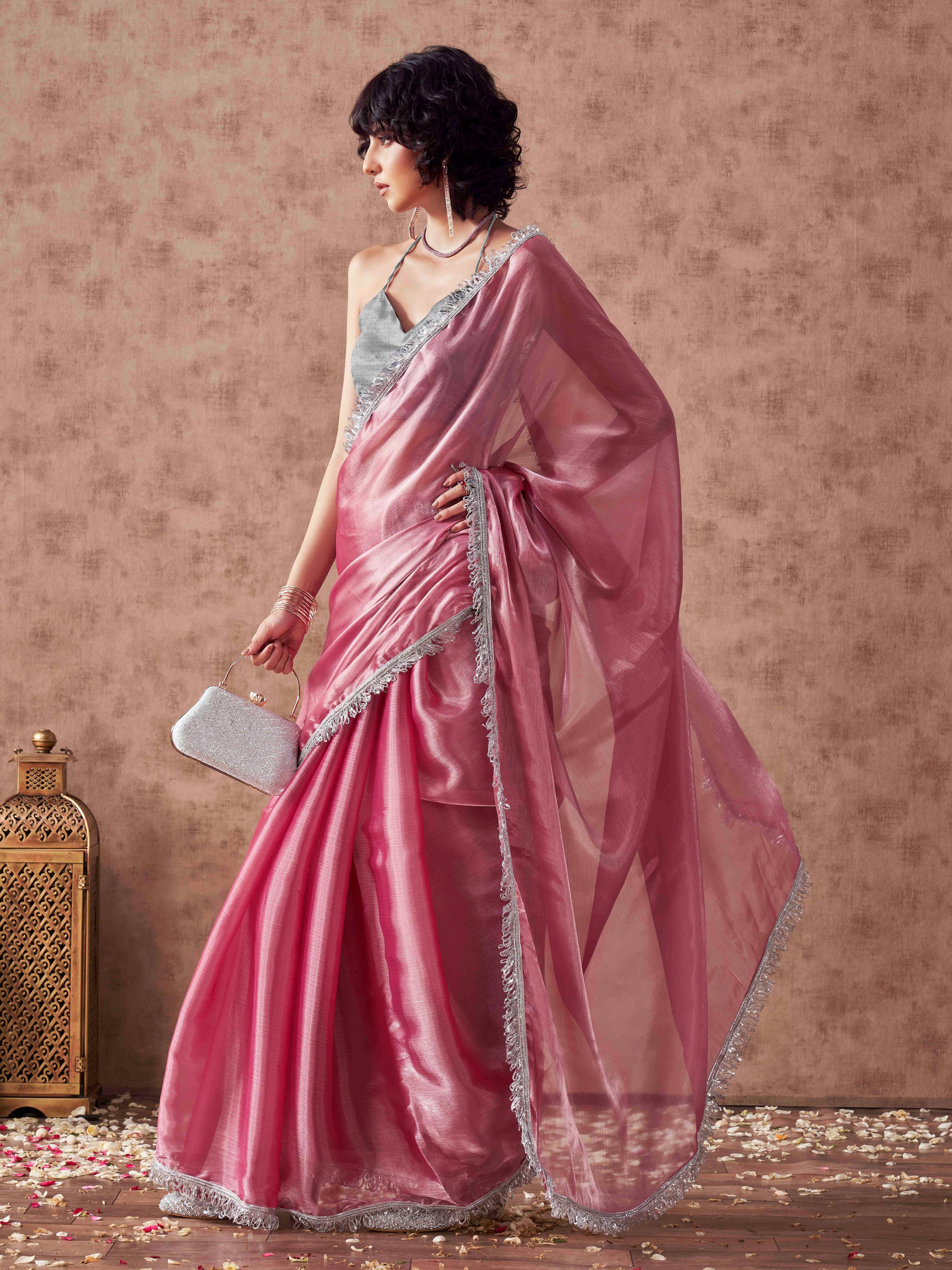 Pink colored satin chiffon saree with fancy designer lace