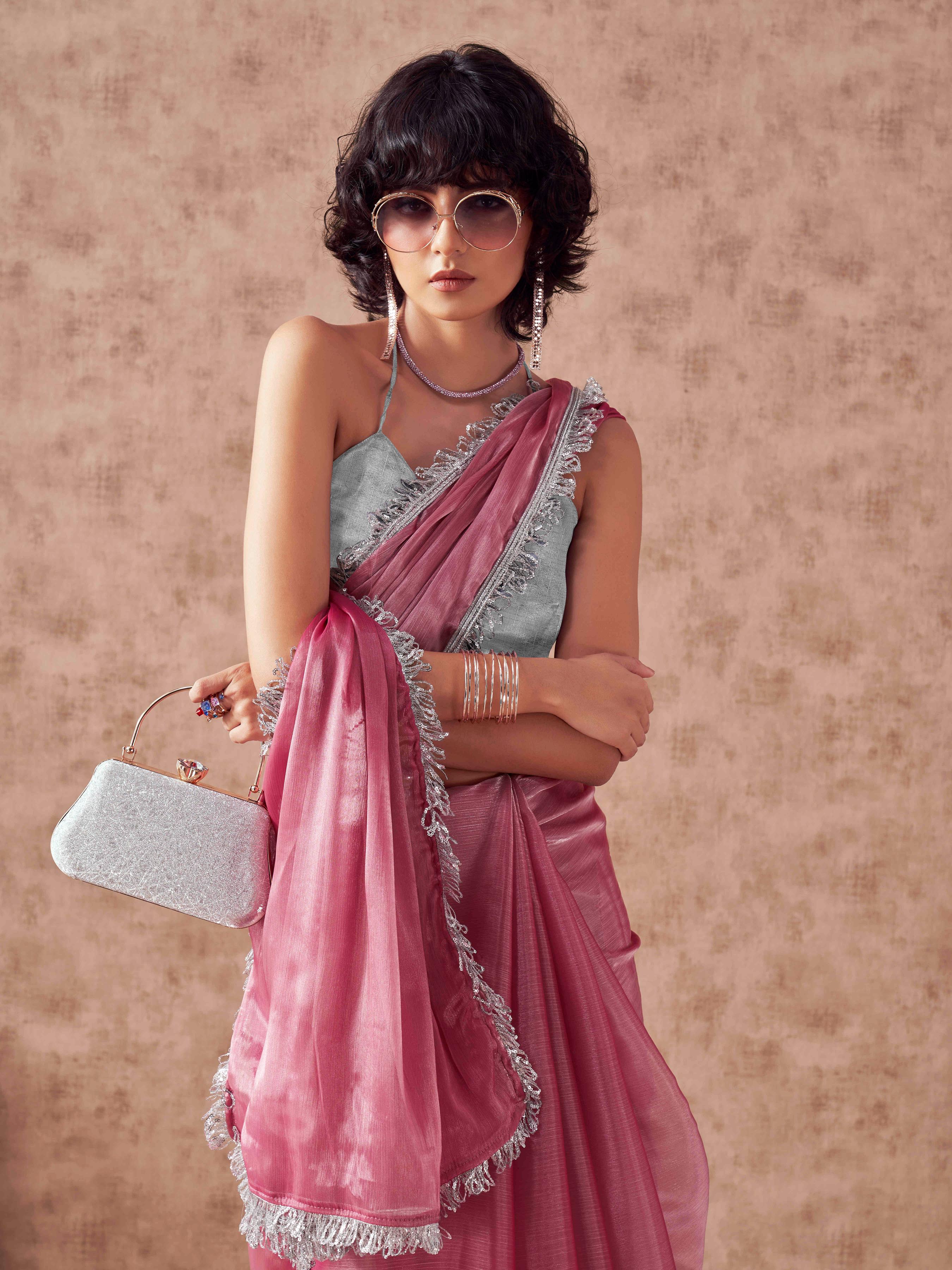 Pink colored satin chiffon saree with fancy designer lace