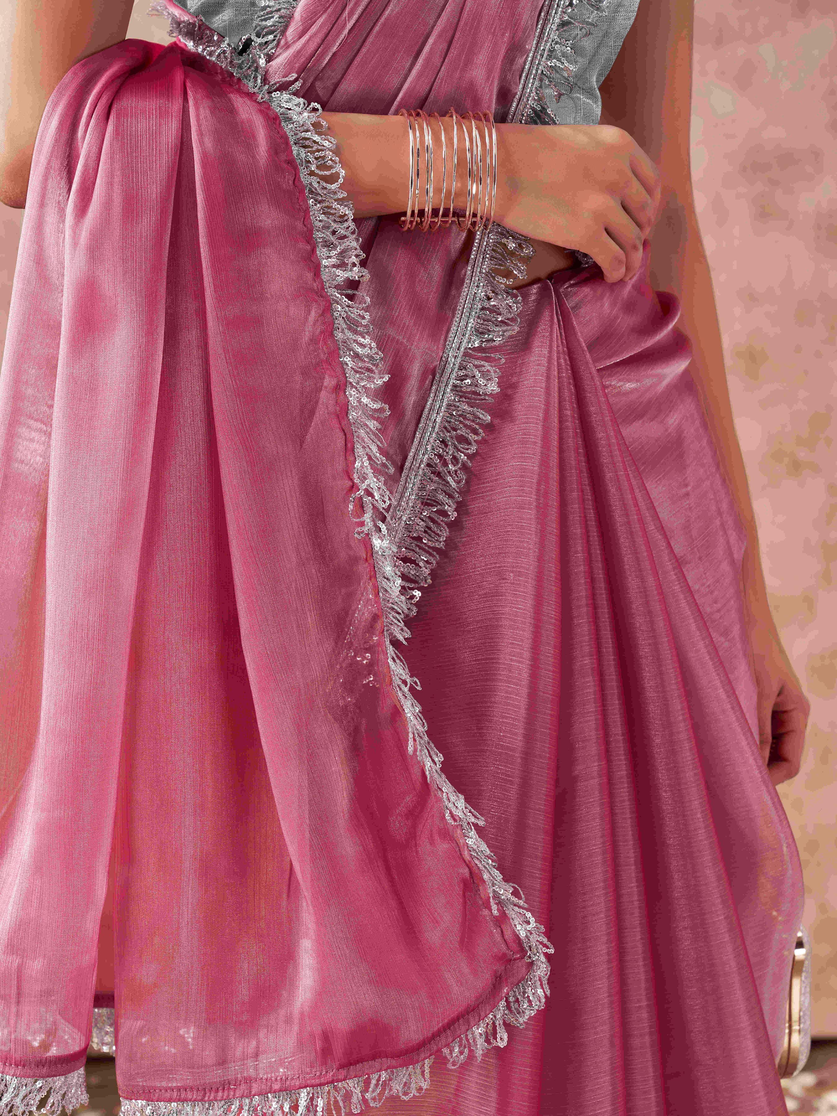 Pink colored satin chiffon saree with fancy designer lace