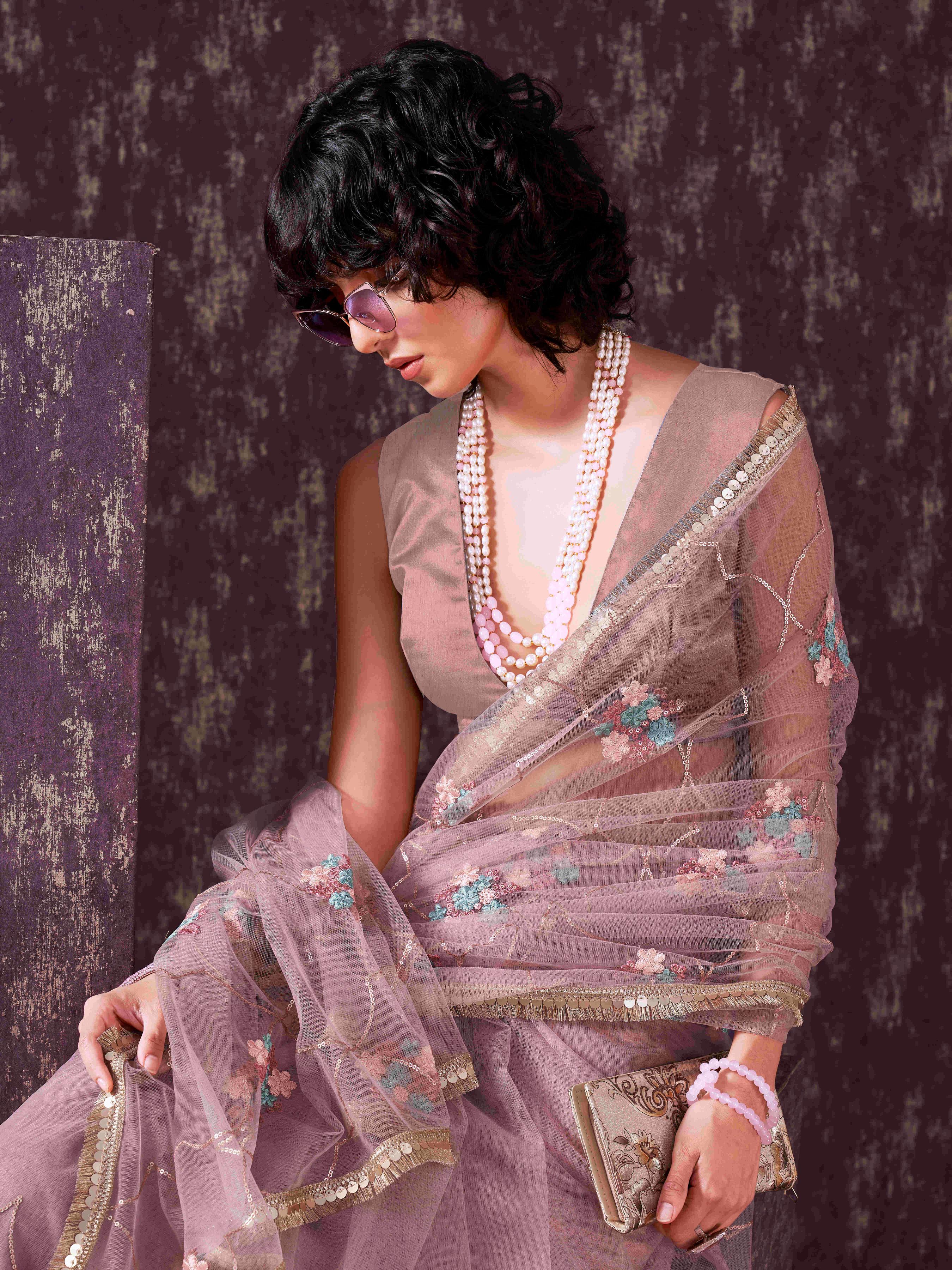 Rose gold colored sequined embroidered net saree with sequined lace